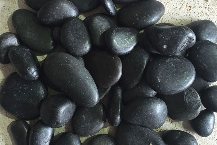 Polished Black Pebble sold here at Epic Stoneworks, South Florida